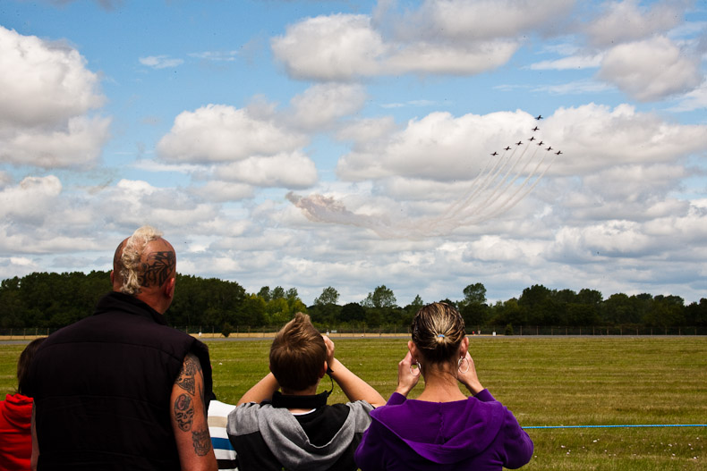 Spectators watching Red Arrows in the Swan formation